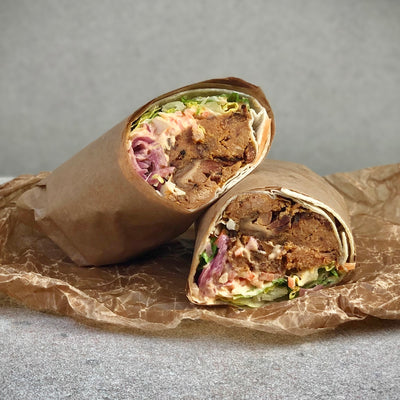 Oumphwrap uppskuren på mitten som ligger på vaxat bakplåtspapper
