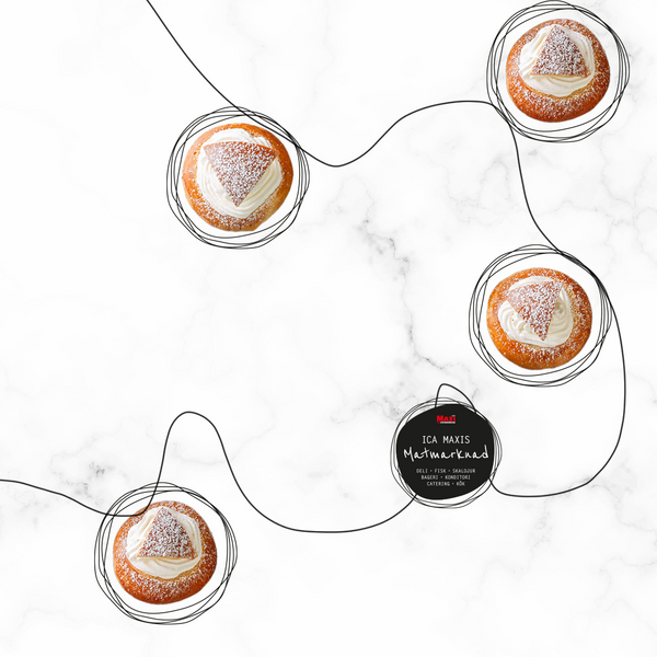 Semlor ligger på vit marmor för att inspirera till fettisdagen